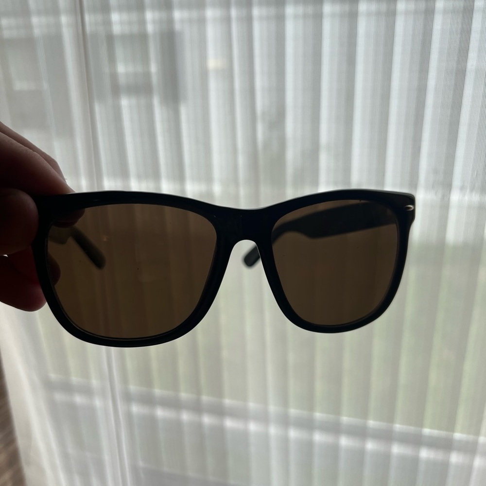 Cole Haan sunglasses.